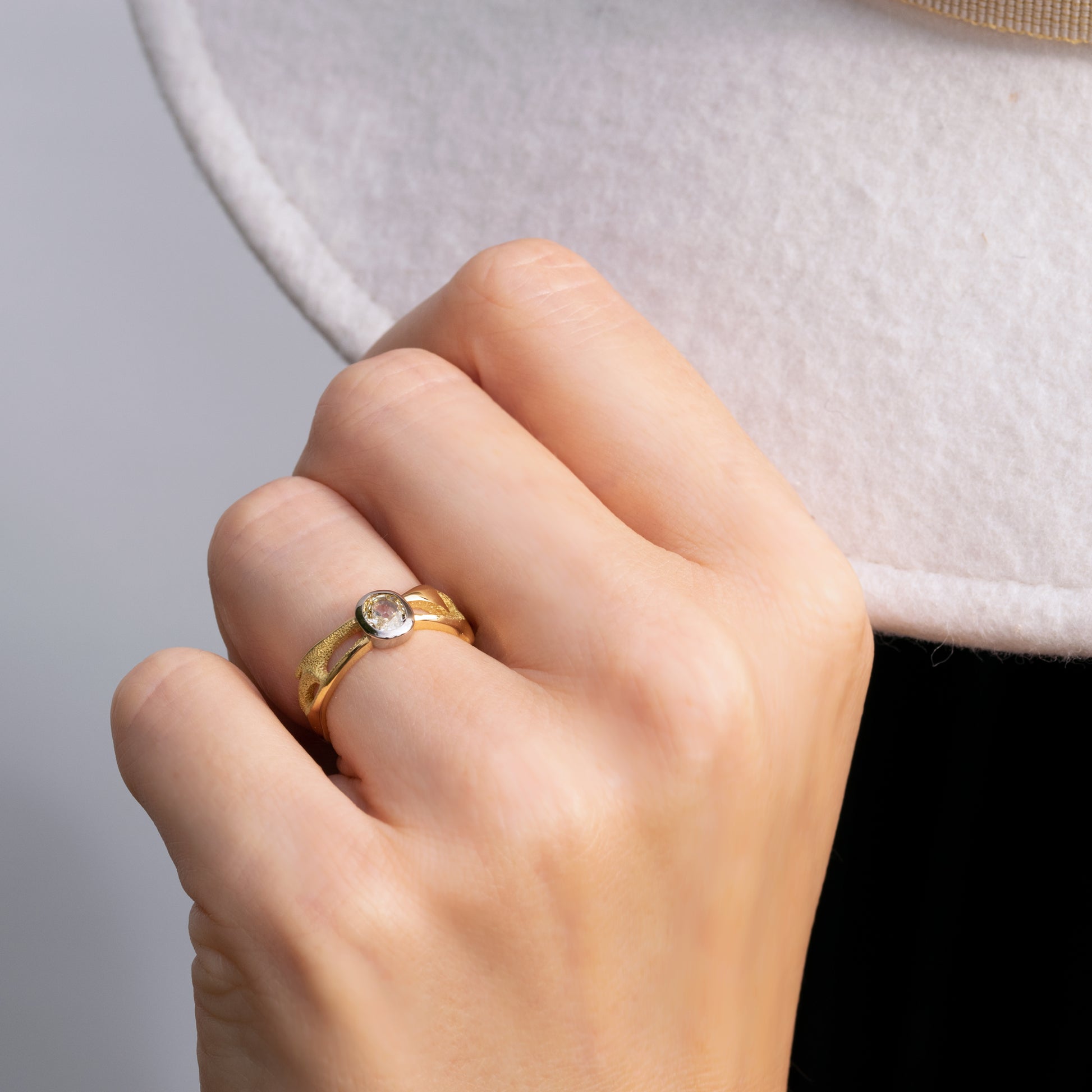 Orme-Brown Contemporary Fine Jewellery Ethical engagement ring in sustainable recycled 18ct yellow and white gold featuring a yellow old cut diamond