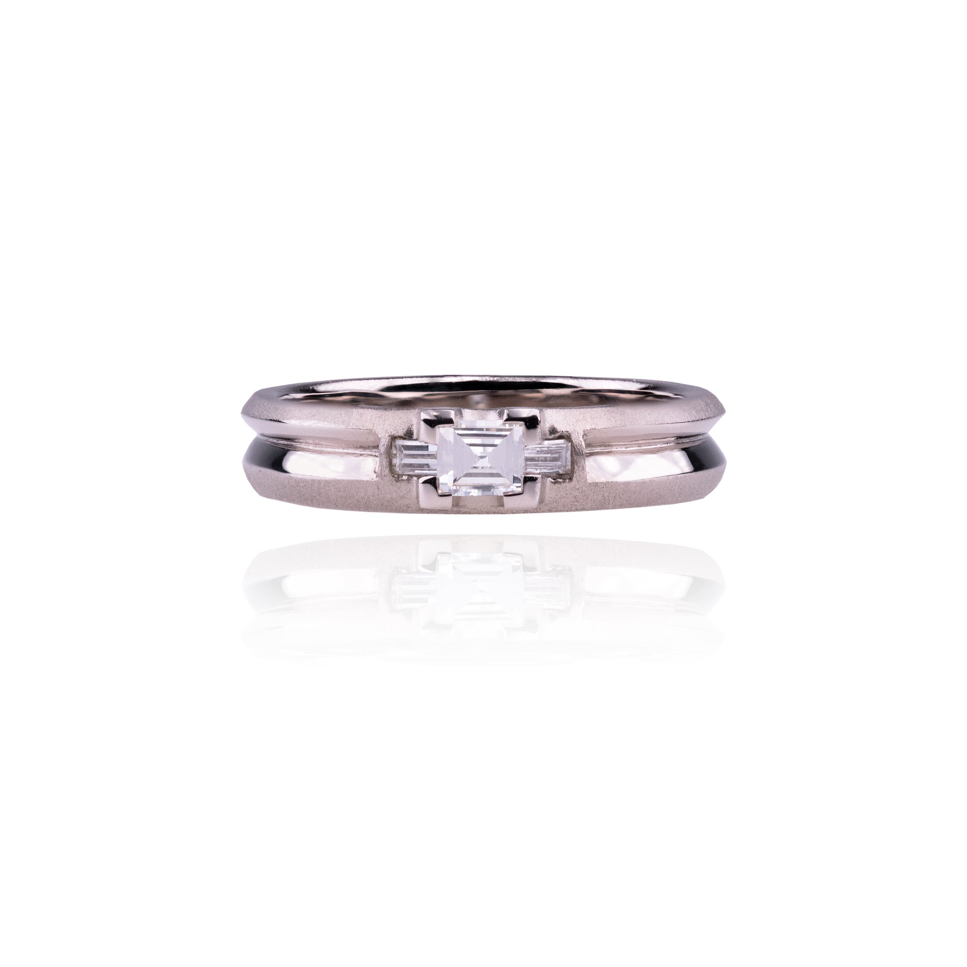 Orme-Brown Contemporary Fine Jewellery Ethical Engagement ring in sustainable recycled 18ct white gold with recycled step cut square and baguette diamonds